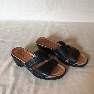 Strictly Comfort black leather slip on sandals.